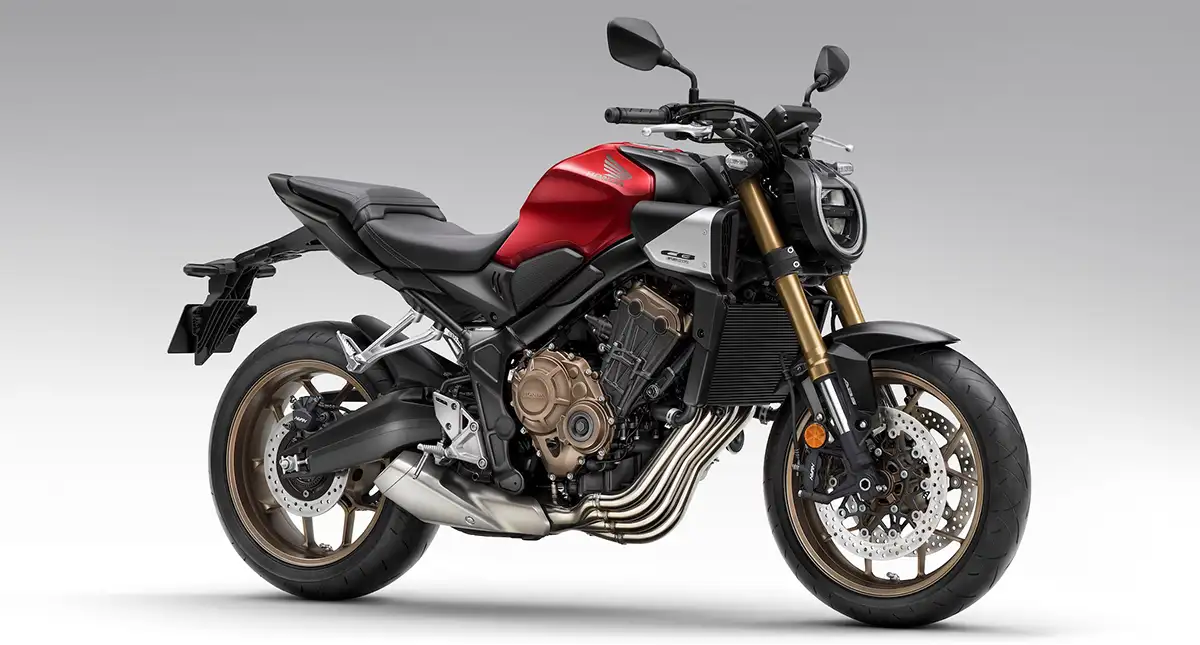 Moto Honda CB 650R E-Clutch vermelha com garfos dourados